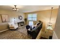 Spacious living room with comfy seating and a loft area at 1906 Young Rd, Lithonia, GA 30058