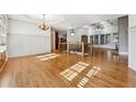 Spacious living room with hardwood floors and coffered ceilings at 100 Pine Sandy Bank Dr, Canton, GA 30114