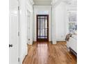 Bright foyer showcasing hardwood floors, neutral walls, and a clear view to the front door at 185 Elvan Ne Ave, Atlanta, GA 30317