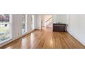 Bright living room featuring hardwood floors and large windows at 3964 Preston Ne Ct, Brookhaven, GA 30319