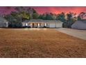 Ranch home with attached garage and large yard at 761 Woodwind Dr, Rockmart, GA 30153