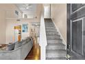 Two-story home interior with hardwood floors and loft area at 849 Hillandale Ln, Lithonia, GA 30058