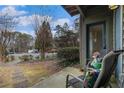 Relaxing patio area with chairs, ideal for enjoying the peaceful outdoor setting at 320 Tuxworth Cir, Decatur, GA 30033