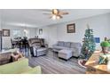 Spacious living room featuring a sectional sofa and recliner at 4646 Biffle Rd, Stone Mountain, GA 30088