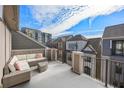 Relaxing rooftop patio featuring comfortable seating and views of the surrounding neighborhood at 607 Broadview Ter, Atlanta, GA 30324