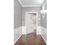 Bright entryway with hardwood floors and white door at 2769 Peachtree Ne Rd # 10, Atlanta, GA 30305