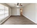 Spacious living room with modern flooring and abundant natural light at 1754 Shirley Sw St, Atlanta, GA 30310