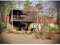 Elevated deck with screen porch overlooks a spacious backyard at 1866 Mary Lou Ln, Atlanta, GA 30316