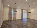 Bright dining room with hardwood floors and neutral walls at 35 Meriwether Dr, Villa Rica, GA 30180