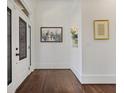 Bright entryway featuring hardwood floors, fresh white paint, and detailed trim at 610 Timm Valley Ne Rd # B, Atlanta, GA 30305