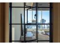 Interior view through divided glass doors showcases city skyline at 3630 Peachtree Ne Rd # 3401, Atlanta, GA 30326