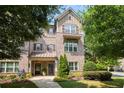 Beautiful two-story brick home with manicured lawn, charming shutters, and a welcoming front entrance at 1365 Hawthorne Se Ave, Smyrna, GA 30080