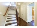 Inviting foyer with hardwood floors and a staircase leading to the upper level at 1365 Hawthorne Se Ave, Smyrna, GA 30080