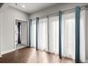 Bedroom featuring large windows with sheer curtains at 2865 Lenox Ne Rd # 410, Atlanta, GA 30324