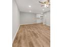 Unfurnished living room boasts new wood floors and neutral paint at 1179 Church St # J, Decatur, GA 30030