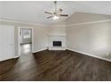 Bright and airy living room with vaulted ceiling and stone fireplace, showcasing its spacious layout at 3764 Cherokee Overlook Dr, Canton, GA 30115