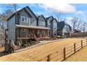 Charming two-story home featuring a covered porch, fenced yard, and landscaped yard at 4115 Merritt Dr, Cumming, GA 30041