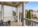 Welcoming front porch showcasing classic railing and columns, perfect for enjoying the neighborhood views at 10 Clarke Hill St, Decatur, GA 30030