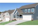 New construction two-story home with attached two car garage and lovely curb appeal at 140 Kingsley Way, Acworth, GA 30102