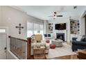 Bright living room with fireplace and custom built-in shelving at 2177 Witton Way, Chamblee, GA 30341