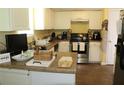 Functional kitchen with essential appliances and ample counter space for meal preparation at 5627 Isleworth Ct, Atlanta, GA 30349
