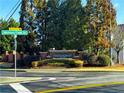 Sign for Harmony Creek neighborhood amidst lush landscaping at the community entrance at 139 Concord Pl, Hiram, GA 30141