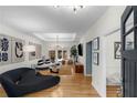 Bright living room featuring hardwood floors, modern lighting, and contemporary decor at 2861 Dorby Close Ne, Brookhaven, GA 30319