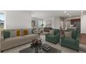 Bright and airy living room with comfortable seating and an open floor plan at 404 Village Ln, Fairburn, GA 30213