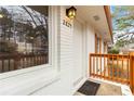 Close-up of front door, shows fresh paint, new light fixture and nice trim at 2825 Middleburg Dr, Atlanta, GA 30349