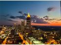 Night panoramic view of downtown Atlanta with building lights and a colorful sky at 400 W Peachtree Nw St # 3216, Atlanta, GA 30308