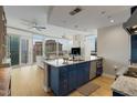 Open concept kitchen with a large island, granite countertops, and modern appliances at 3325 Piedmont Ne Rd # 1907, Atlanta, GA 30305