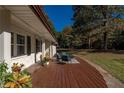 Spacious front porch with views of the surrounding greenery, ideal for enjoying the outdoors at 2750 Old Horseshoe Bend Sw Rd, Marietta, GA 30064