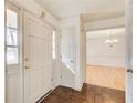 Welcoming foyer features hardwood floors and view to the dining room at 2658 Stonehenge Ct, Dunwoody, GA 30360