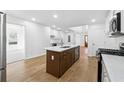 Beautiful kitchen with a large island and stainless steel appliances at 438 Ansley St, Decatur, GA 30030