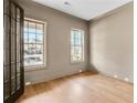 Bright home office with wood floors, large windows providing natural light, and stylish trim at 3927 Enclave Way, Tucker, GA 30084