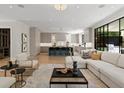 Open concept living room leading to a large kitchen island and an outdoor patio at 42 Blackland Nw Rd, Atlanta, GA 30342