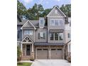 Charming townhome with a two-car garage and craftsman-style details at 224 Trecastle Sq # 22, Canton, GA 30114