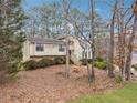 View of home, showing front yard and architectural details at 6664 Windwood Cir, Douglasville, GA 30135