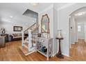 Elegant foyer showcasing hardwood floors, staircase, and stylish decor at 343 Woodstone Dr, Marietta, GA 30068