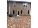 Backyard exterior featuring a door, windows, and patio area at 256 Oakview Dr, Canton, GA 30114