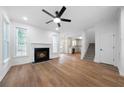 Bright living room with a fireplace and hardwood floors, creating a cozy and inviting atmosphere at 780 Gardenside Se Cir, Marietta, GA 30067