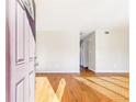 Bright living room with fresh paint and beautiful hardwood flooring at 1807 Ashborough Cir # G, Marietta, GA 30067