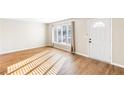 Inviting living room with plenty of natural light and hardwood flooring at 1807 Ashborough Cir # G, Marietta, GA 30067