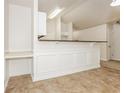 Bright dining room featuring a tiled floor and an eat-in breakfast bar at 621 Shadow Lake Dr, Lithonia, GA 30058