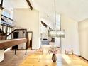 Elegant dining room showcasing an ornate chandelier and an open floor plan at 3150 Bolero Dr, Atlanta, GA 30341