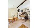 Charming dining space with a view of the staircase at 3150 Bolero Dr, Atlanta, GA 30341