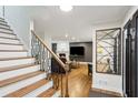 Inviting living room with a fireplace, hardwood floors, and cozy seating at 1524 Chateau Dr, Dunwoody, GA 30338