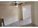 Open living space features ceiling fan and entry to another room at 2722 Penwood Pl, Lithonia, GA 30058