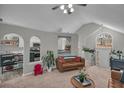 Open living room showcases high ceilings, a decorative archway and great natural light at 4804 Mceachern Way, Powder Springs, GA 30127