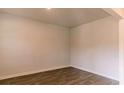 Neutral bedroom showcasing natural light and wood flooring at 412 Barley Lot 86 Ct, Covington, GA 30014